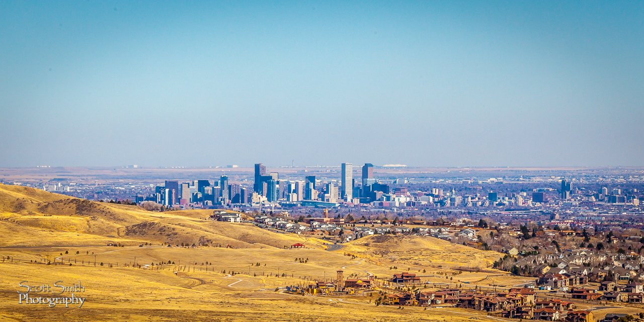 A Hill with a View - From Morrison, CO - a view of downtown Denver, and even the white canopies of the airport terminals in the distance. by Scott Smith Photos
