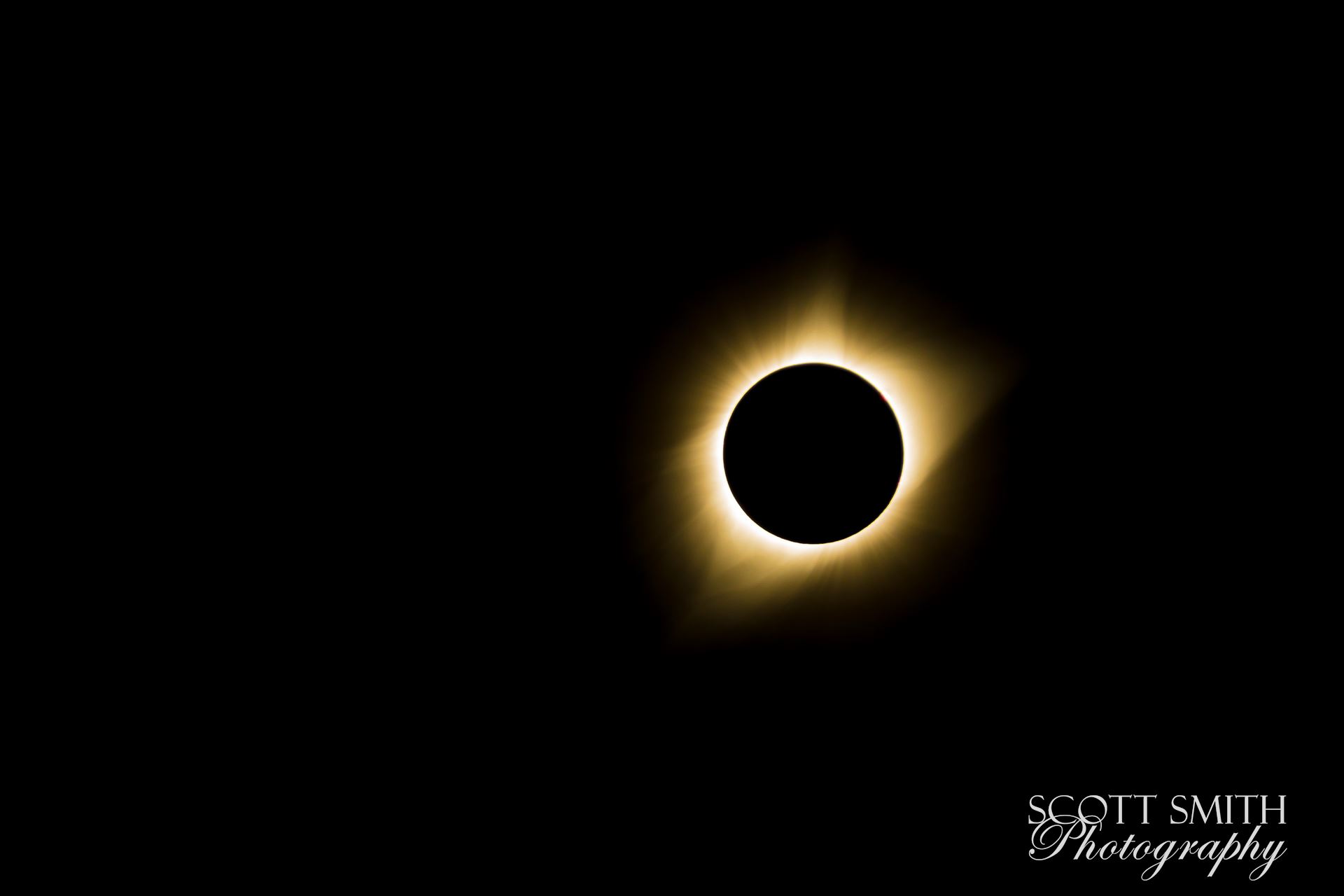 2017 Solar Eclipse 12 B - Total solar eclipse, at Carhenge in Alliance. Nebraska August 21, 2017, adjusted to remove the point of light in the left center of the frame. by Scott Smith Photos