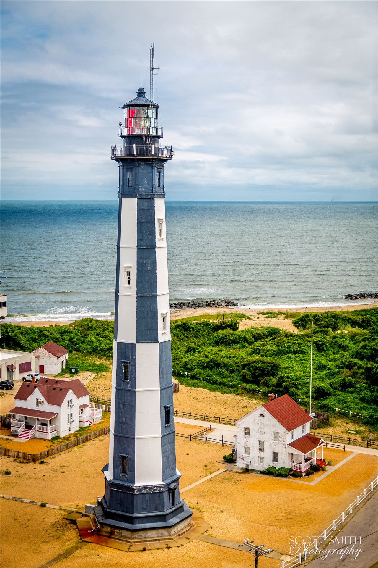 Cape Henry Lighthouse in Virgina - The newer Cape Henry lighthouse, taken from the original lighthouse, now retired. by Scott Smith Photos
