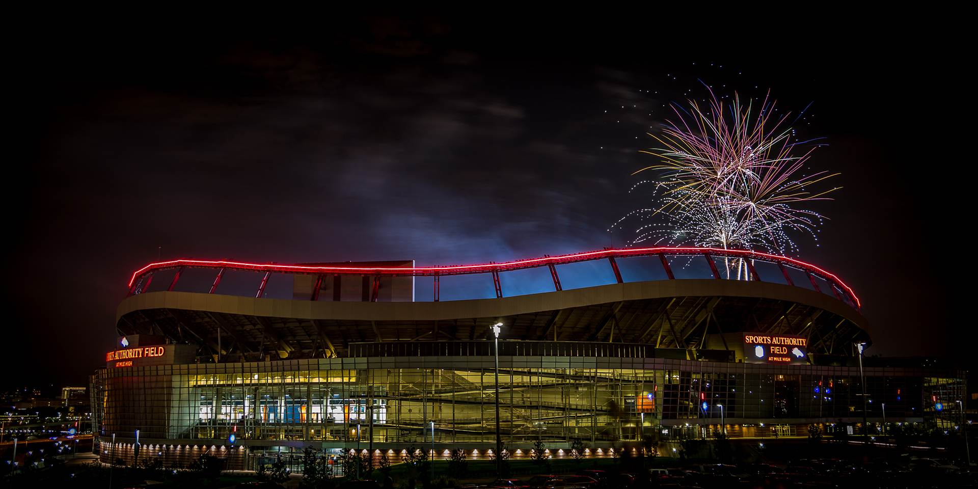 Fireworks at Mile High Stadium - Fireworks over Mile High Stadium in Denver, Colorado on the Fourth of July. by Scott Smith Photos