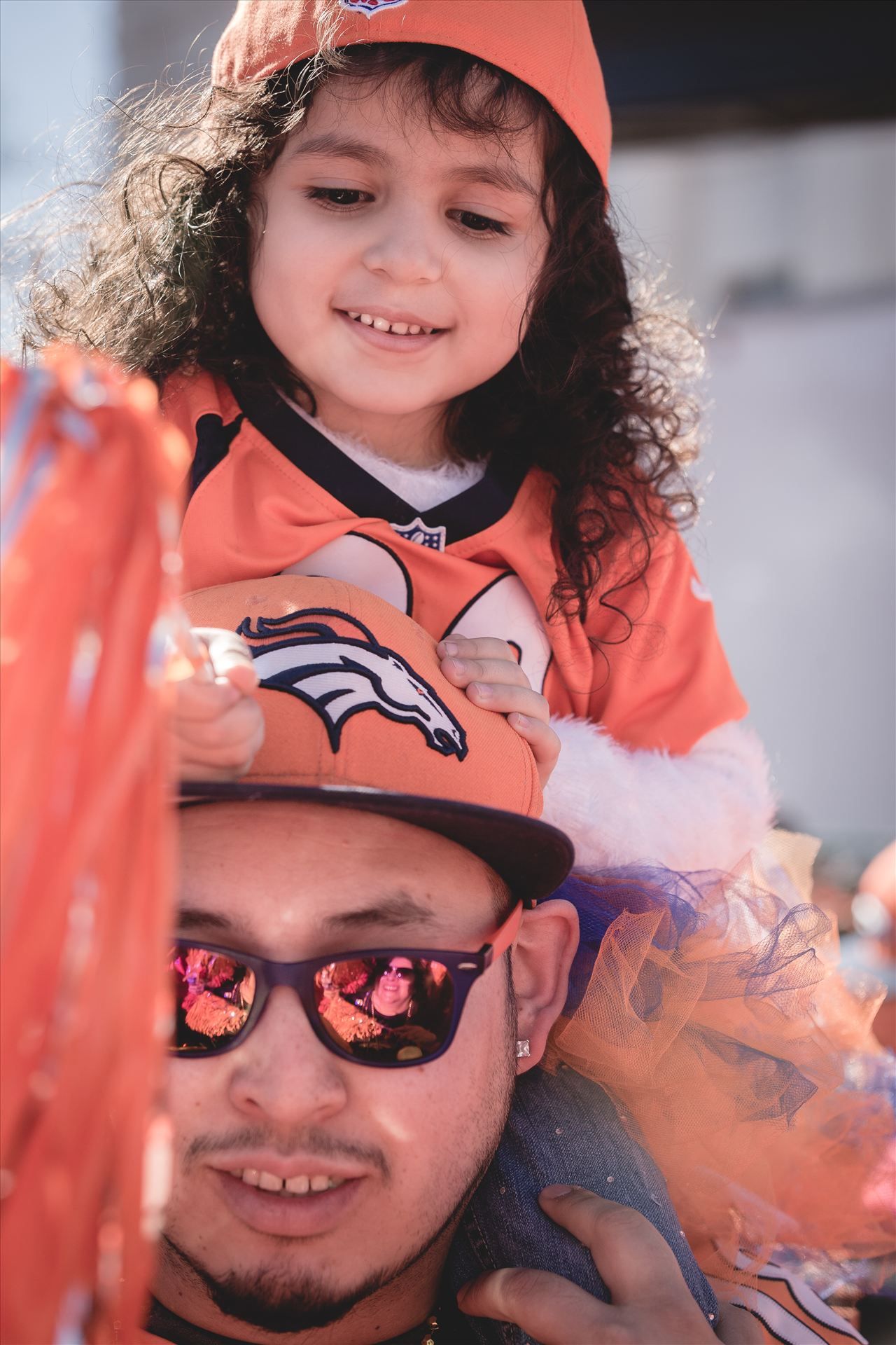 Father Daughter Broncos Fans - If you know who these two are... please contact me! I'd love to pass their photo long to them. by Scott Smith Photos