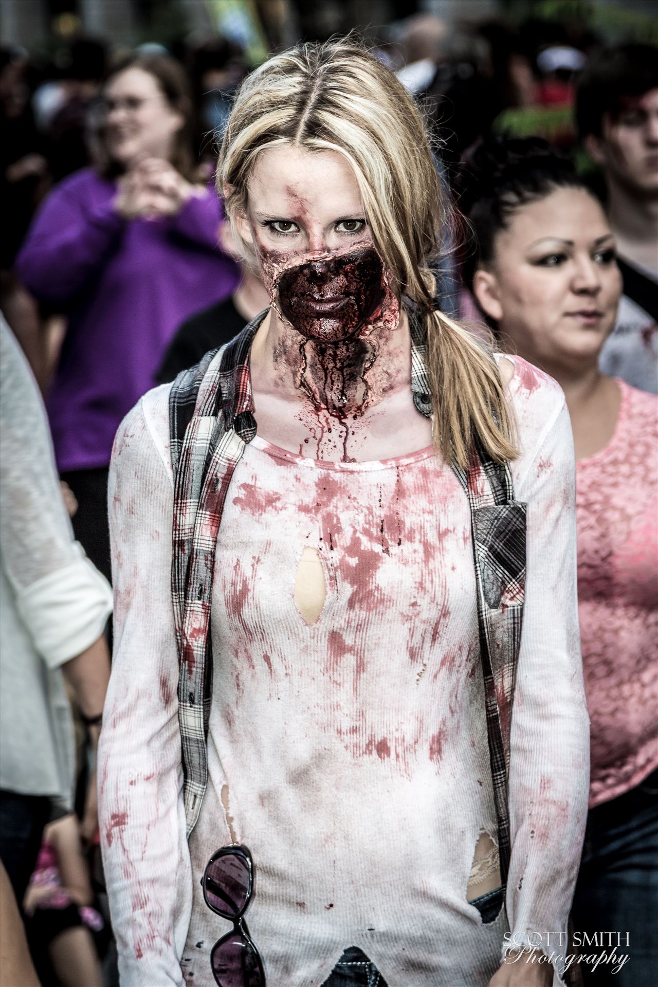 Denver Zombie Crawl 2015 23 - An attractive zombie walks the streets of Denver. Well, attractive to other zombies! by Scott Smith Photos