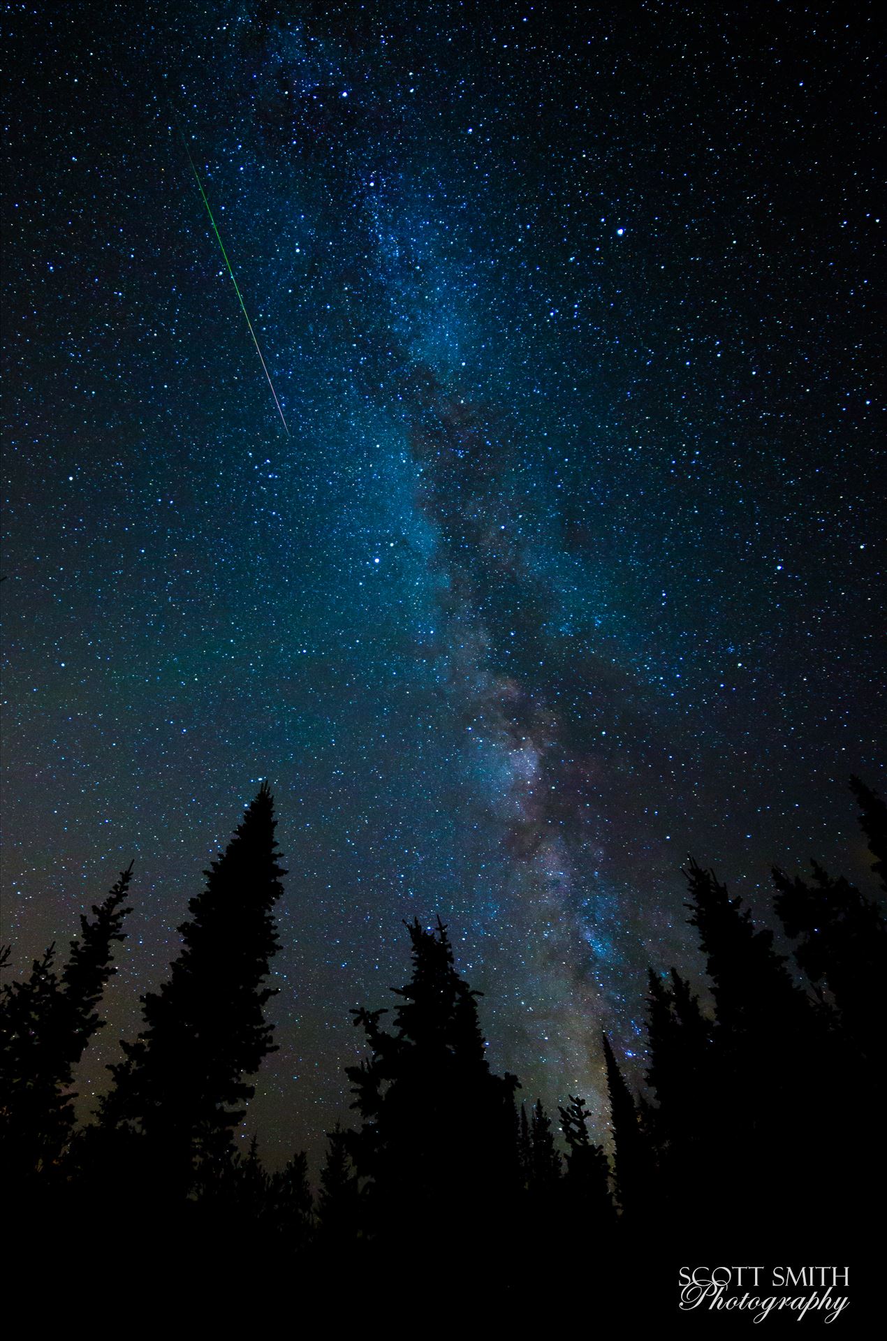Milky Way and Meteorite from the Perseids - A lone meteorite streaks through the sky near the Milky Way, at the Brainard Lake State Recreation Area near Ward, Colorado. by Scott Smith Photos