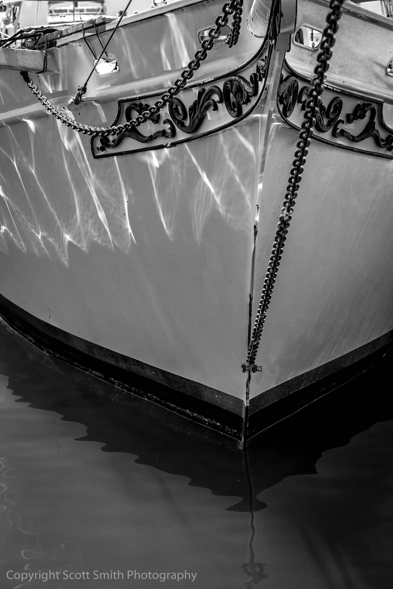 Reflections - A beautiful old ship rests at dock in a Key West marina. by Scott Smith Photos