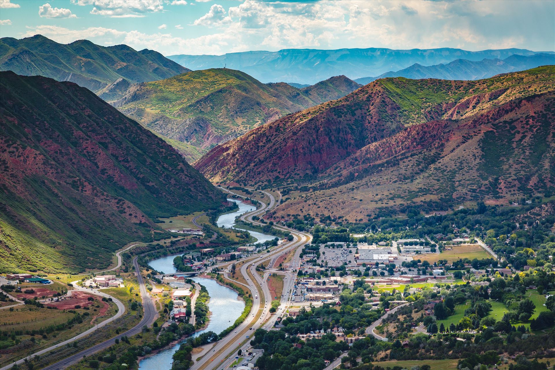 Glenwood Springs from Glenwood Caverns No 2 - Landscape version of the view from the top of Glenwood Caverns, the city of Glenwood Springs, Colorado looks miniature. by Scott Smith Photos
