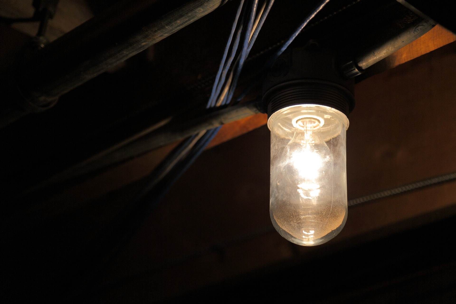 What Goes Bump in the Night? - A lone light fixture lights the basement of the Overlook, err, Stanley Hotel - in Estes Park, CO. by Scott Smith Photos