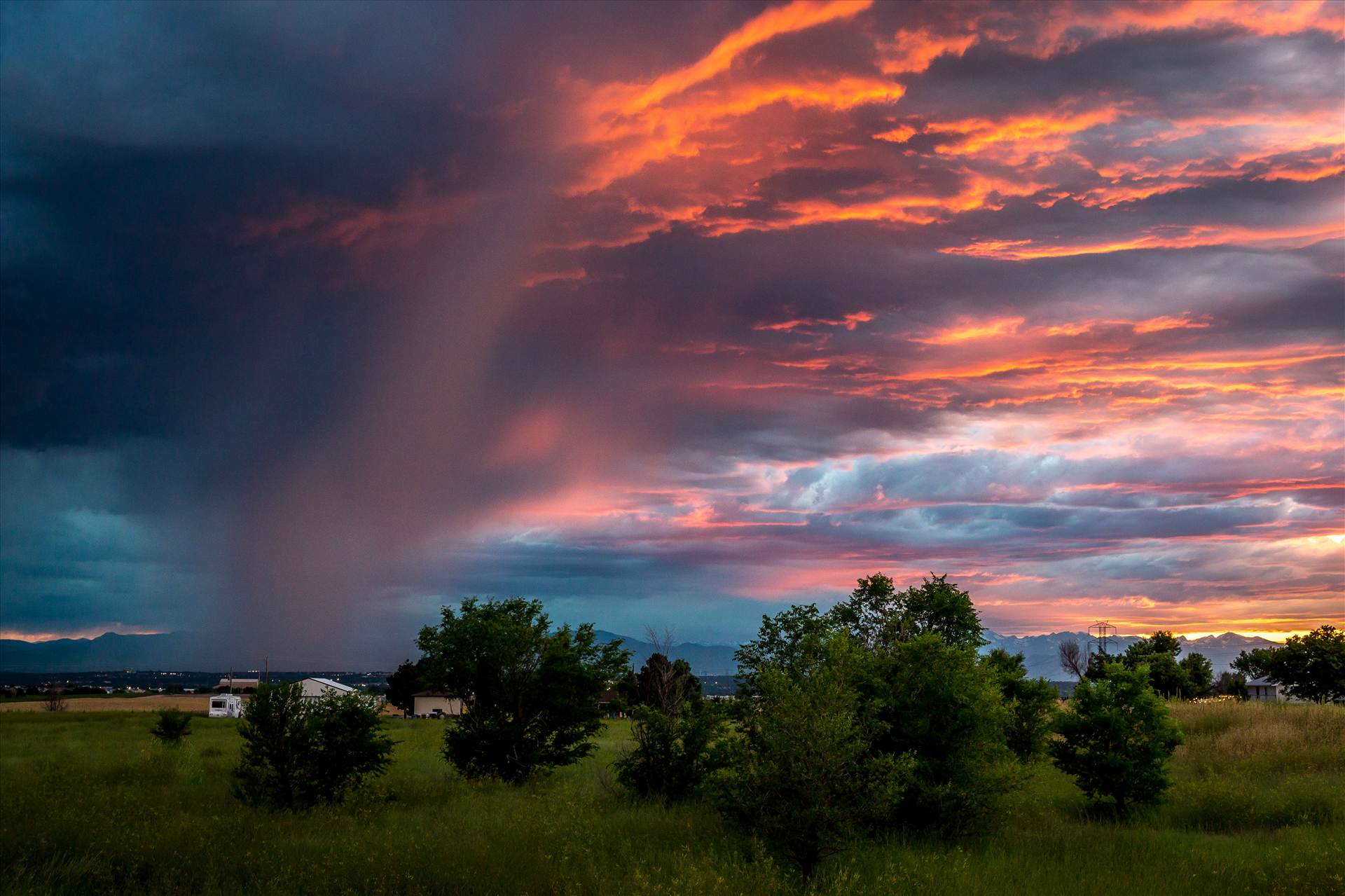 Sunset Storm - A storm rolls in just as the sun sets, highlighting the clouds with beautiful colors. by Scott Smith Photos
