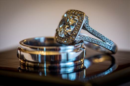 A close up of wedding rings just before a ceremony.