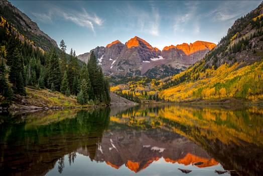 A chilly September morning.  The sun lights the peaks of the Maroon Bells.