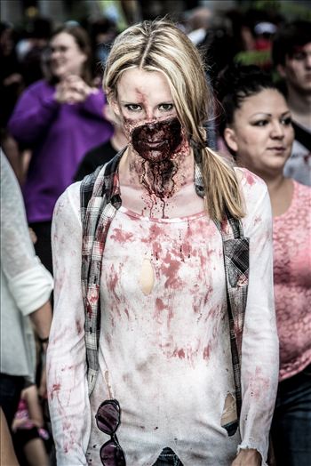 An attractive zombie walks the streets of Denver. Well, attractive to other zombies!