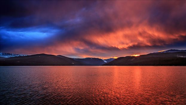 Sunset on the calm protected waters of Turqouise Lake, Leadville Colorado.