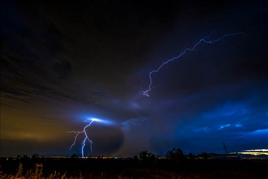 A series of shots from the end of the street, during a powerful lightning storm near Reunion, Colorado.