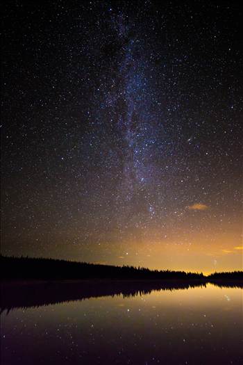The Milky Way over Brainard Lake, on August 13th, during the Perseid meteor shower. No meteorites show in the image, but the reflection of the stars on the water is striking. The Andromeda galaxy makes an appearance, in the middle of the right half of the